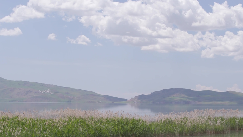 Clouds rush over the great lake.  