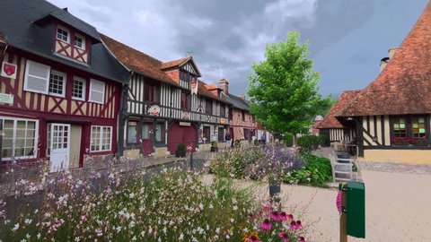 Beuvron en Auge, France - August 3, 2021: Scene from Beuvron-en-Auge, one of the most beautiful villages in France, is a commune in the Calvados department and Normandy region.