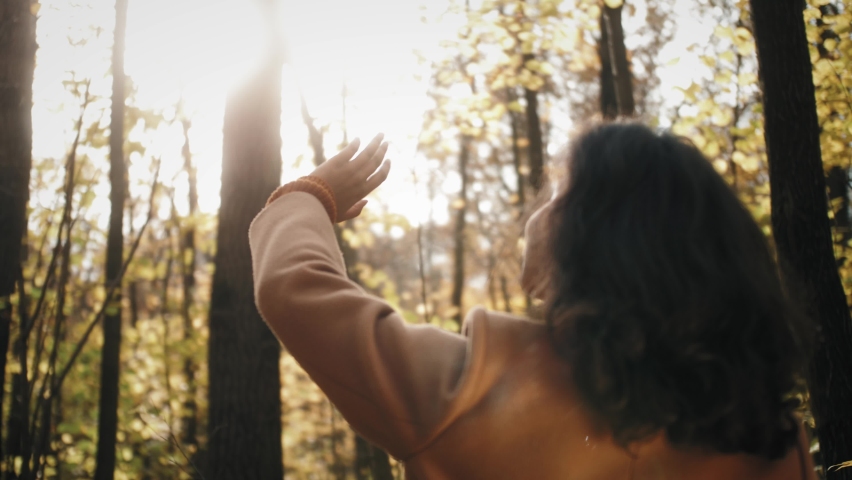Autumn Outdoor Portrait Of Beautiful African American Young Woman, Black People, latin female in park hold leaves, autumn mood
