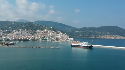 Skopelos, Greece - November 2019: Express Skiathos Ferry boat from Hellenic Seaways company leaving the port of Skopelos island in Chora, Sporades, Greece
