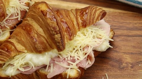 ham croissant on a cutting board