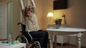A disabled man is spreading his arm in different sides 