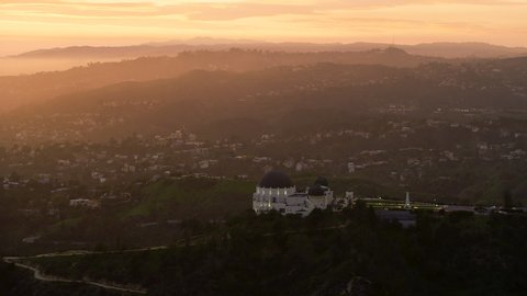 Los Angeles, California, United States, circa 2019: Amazing view of the Griffith Observatory in Mount Hollywood. Los Angeles, California. Beautiful sky during sunset.