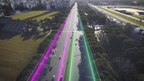 Aerial flyover cars driving on digital modern highway in direction Buenos Aires City during sunset - Tracking shot of vehicles on avenue with glowing lines for communication - 4K Future Concept - Powered by Shutterstock - Get 15% off with code: PIKWIZARD15