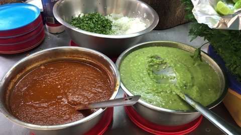 Spicy green and red salsa sauces for Mexican street food like tacos and burritos
