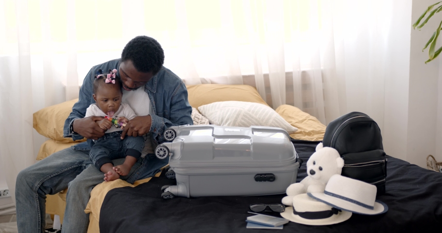 An African American family getting ready for a vacation