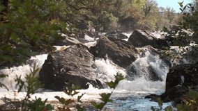 4K slow motion footage of mountain river cascades and waterfalls