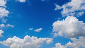 Timelapse of Blue sky and white clouds. Building motions clouds. Cumulus cloud cloudscape timelapse. Summer blue sky time lapse. Nature weather blue sky. Cloudscape time-lapse and nature concept.