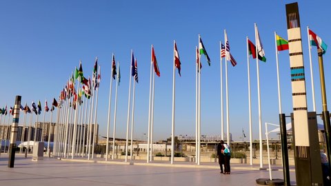 Dubai, United Arab Emirates - October 13, 2021: A view of the flags at the entrance gate at the Expo 2020 Dubai UAE