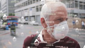 Animation of covid 19 icons over senior man wearing face mask. global covid 19 pandemic and vaccination concept digitally generated video. - Powered by Shutterstock - Get 15% off with code: PIKWIZARD15