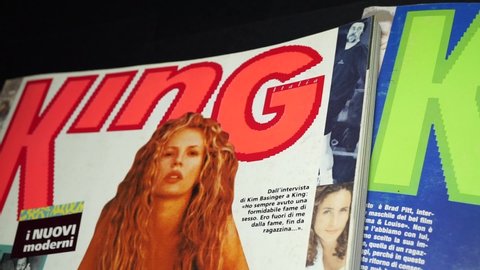 Rome, Italy - October 14, 2021, detail of the covers of King magazine, now out of print. The magazines are from October 1989 and 1991 and feature the young actress Kim Basinger and a young Brad Pitt.