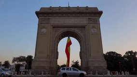 Bucharest traffic in the morning, 4k video view to Arch of Triumph, an amazing landmark in Romania