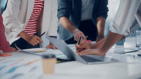 Multi-Ethnic Office Conference Room Businesspeople Meeting at Big Table. Diverse Team of Creative Entrepreneurs Talk, Use Laptop. Specialists work in Digital e-Commerce Startup. Focus on Hands - Powered by Shutterstock - Get 15% off with code: PIKWIZARD15