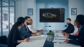 Multi-Ethnic Office Conference Room Meeting: Team of Industrial Engineers, Technicians Talk, Use Digital Interactive TV with 3D Car Concept. Eco-friendly, Green Renewable Energy Vehicle Prototype - Powered by Shutterstock - Get 15% off with code: PIKWIZARD15