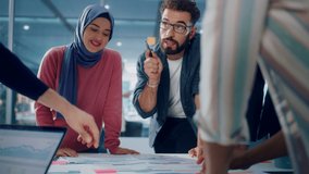 Multi-Ethnic Office Conference Room Businesspeople Meeting Gather Around Table. Diverse Team of Creative Professionals Talk, Brainstorms, work in Innovative Digital e-Commerce Startup. Slow Motion - Powered by Shutterstock - Get 15% off with code: PIKWIZARD15