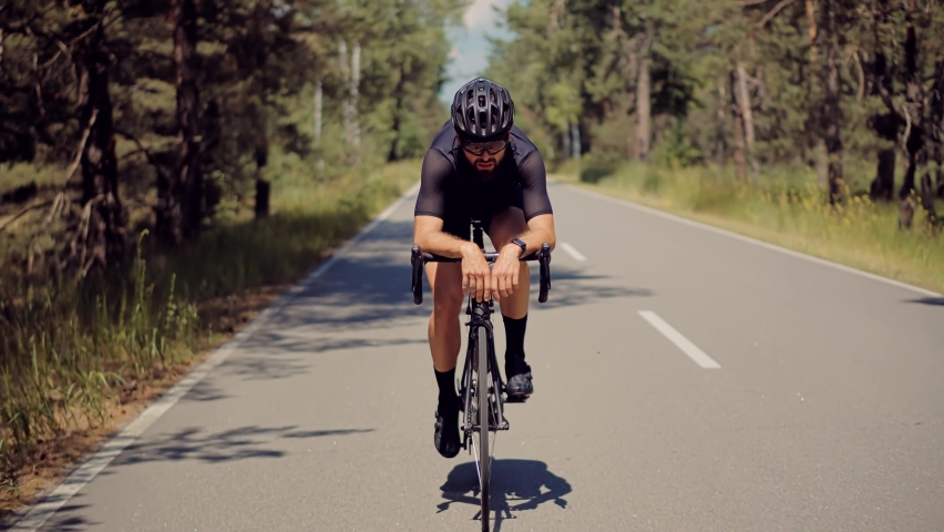 Hard Workout.Triathlete Cyclist Training On Bicycle. Cyclist Sport Fitness Riding Road Bike Ready  Triathlon.Fit Athlete Workout Training Cycling For Triathlon Competition.Sport Concept Transportation | Shutterstock HD Video #1080879371