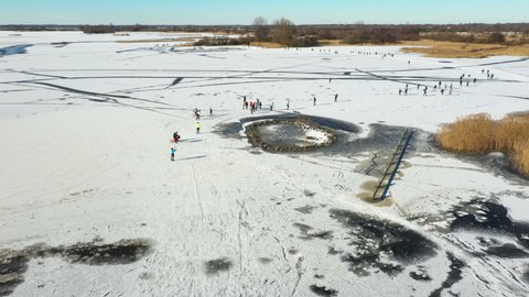 Aerial from ice skating on Bergumer lake in Friesland the Netherlands