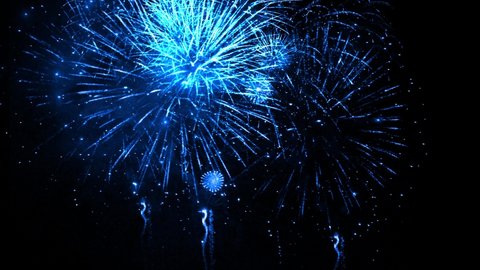 Blue big shiny fireworks bokeh lights in the night sky firework show. Loop Animation Background. Birthday, Anniversary, Celebration, Holiday, new year, Christmas, festival, greeting, Diwali.