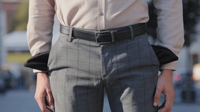 Close-up unrecognizable man turning empty pockets in male pants. Poor businessman has money problems finances crisis economic unemployment non-payment. Cropped view guy need salary debt loan help - Powered by Shutterstock - Get 15% off with code: PIKWIZARD15