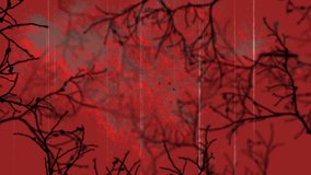 Animation of halloween interference over tree branches on red background. halloween, autumn, celebration and tradition concept digitally generated video.