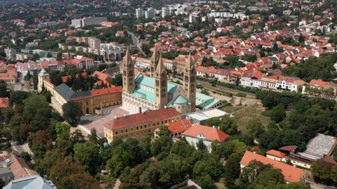 Aerial View On Pecs City Historic Downtown And Basilica In Springtime - Unique medieval mood city in Hungary - drone shot