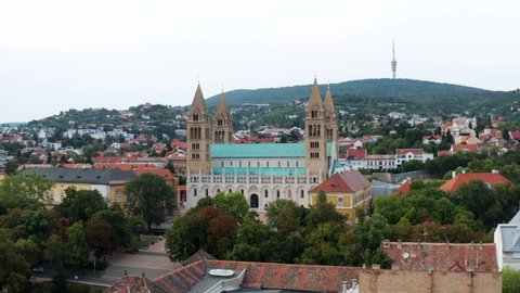 Sts. Peter And Paul Cathedral Basilica Amidst The City Of Pecs In Hungary. aerial