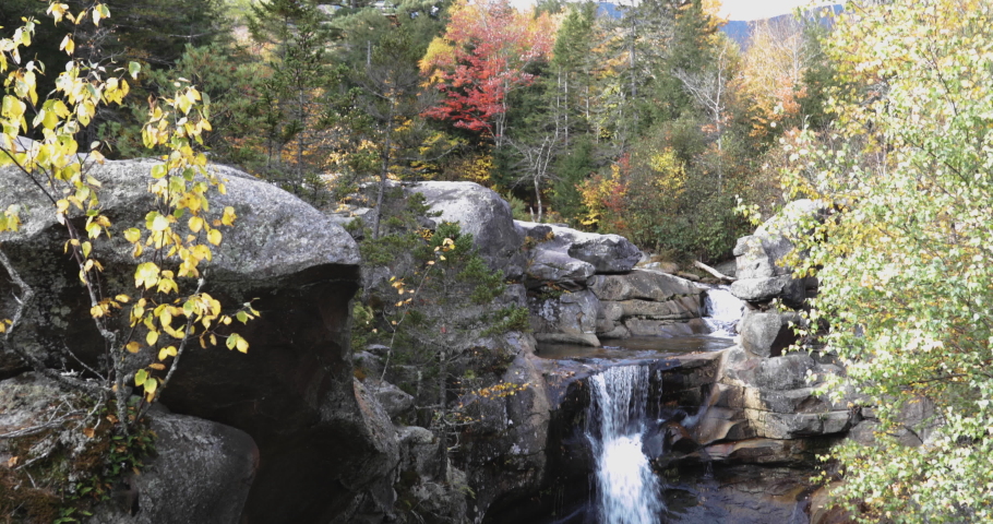 Gorgeous panning shot of the Screw Auger Falls in Autumn