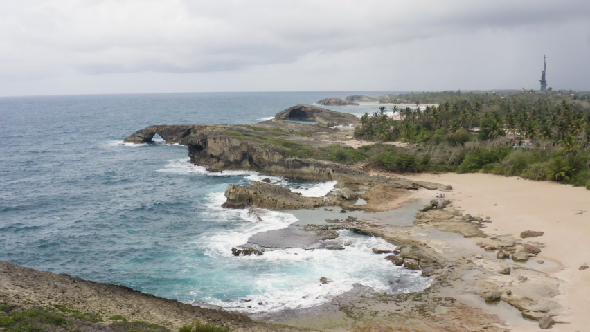 Ocean Waves Crashing On Rocky Coast Of Playita Inez Near El Indio Cave In Las Piedras, Puerto Rico. - aerial