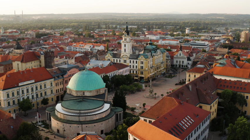 Historic Mosque Of Pasha Qasim Now Converted To Catholic Church At The City Center Of Pecs In Hungary. aerial