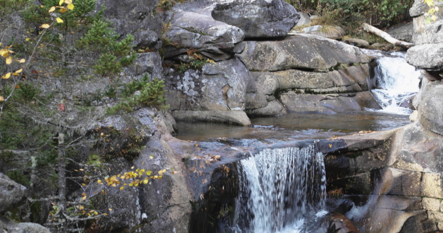Stunning panning close up of the Screw Auger falls in Autumn.