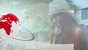 Animation of computer circuit board, world map and globe over asian woman using smartphone. global communication, data sharing and digital interface concept, digitally generated video. - Powered by Shutterstock - Get 15% off with code: PIKWIZARD15