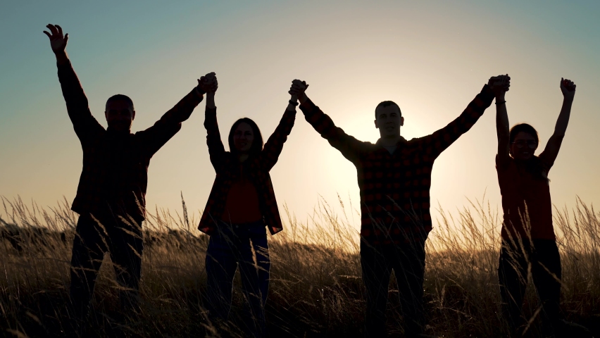 Teamwork. Group of business people holding hands. Business team of winners. Silhouette of people teamwork. Success people winners hold hands. Farmers business team. Success team of business people. Royalty-Free Stock Footage #1080916988