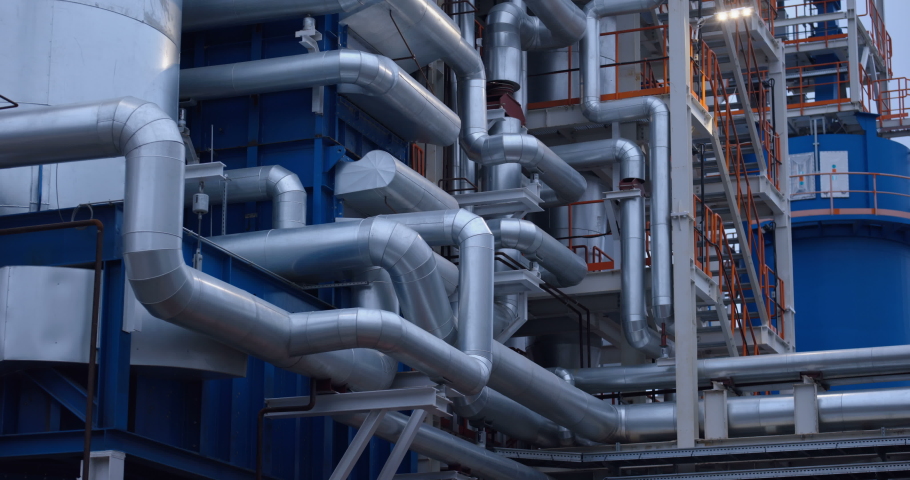 A new modern plant with production workshops, technological lines, pipelines, valves, tanks, other equipment in the infrastructure of the newly built complex 