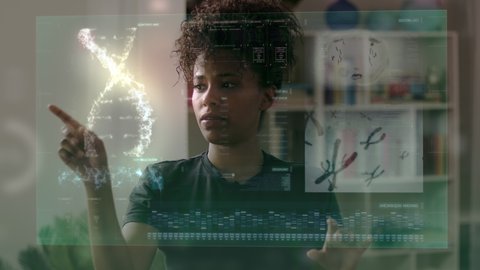 Close-Up Shot of African American Female Doctor or Student With Augmented Reality or Virtual Reality Holographic Animation Looking at Futuristic Medical Charts. MRI, Brain, DNA And Science Animations.