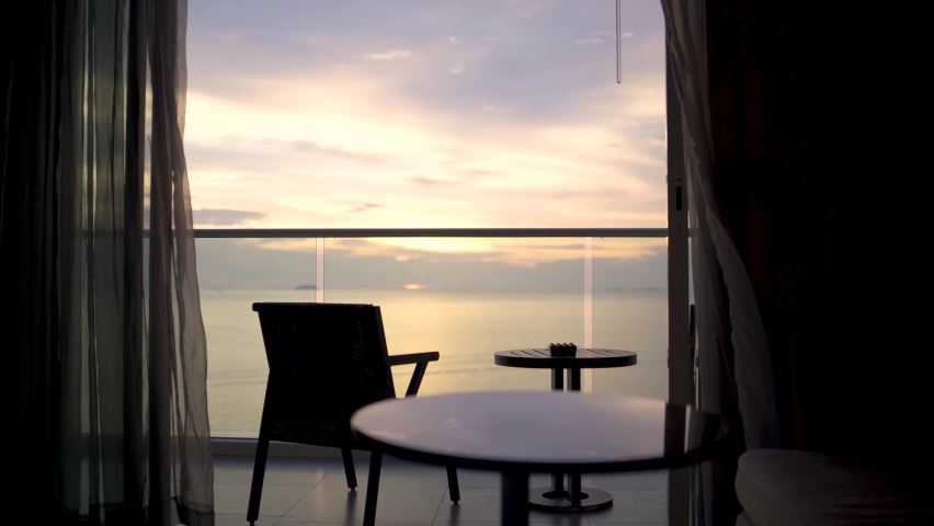 Seaside room balcony at sunset time. Royalty-Free Stock Footage #1080936653