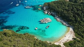Aerial drone video of beautiful azure exotic turquoise beach of Vrika in island of Antipaxos, Ionian, Greece