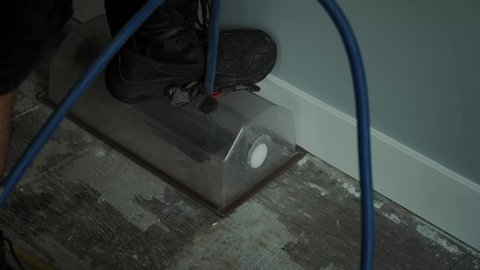Home Duct Cleaning Services, ventilation cleaner man at work with tool. Slow motion shot
