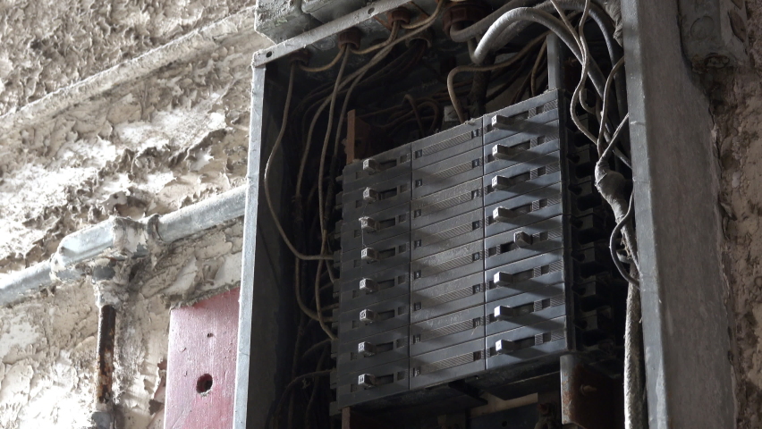 Breaker panel in abandoned building.