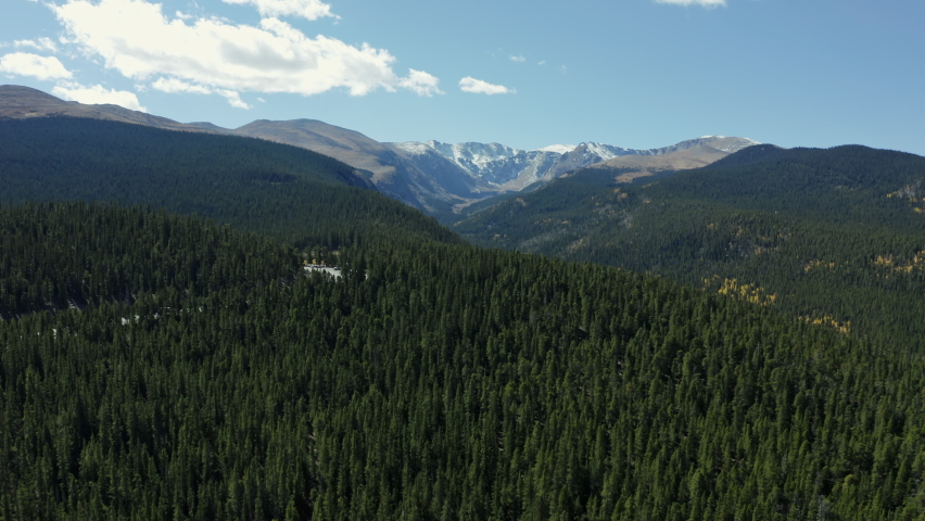 Aerial view over beautiful Echo Lake moving towards Mt Evans Colorado, 4K