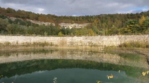 Beautiful colored lake at abandoned chalk and limestone quarry in Limburg, the Netherlands