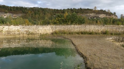 Beautiful colored lake at abandoned chalk and limestone quarry in Limburg, the Netherlands