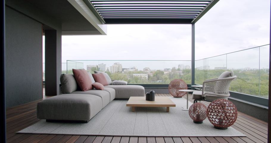 Modern real terrace, in luxury house with beautiful furniture and sliding door, Modern real apartment with sliding door, beautiful furniture and kitchen table. Minimalist black and white design Royalty-Free Stock Footage #1080986987