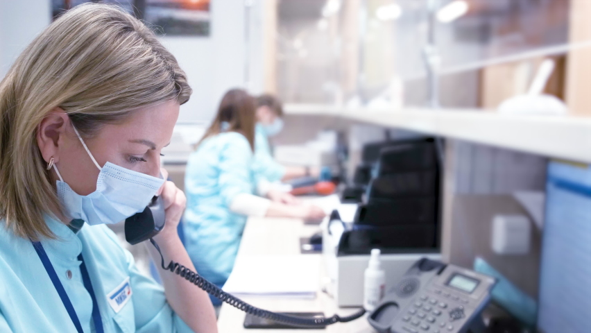 Call Center Medical Service. Happy Doctor On Phone Royalty-Free Stock Footage #1080989345