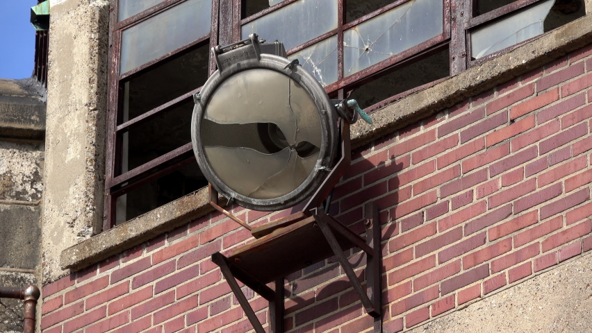 Prison searchlight mounted to abandoned guardhouse at Eastern State Penitentiary.