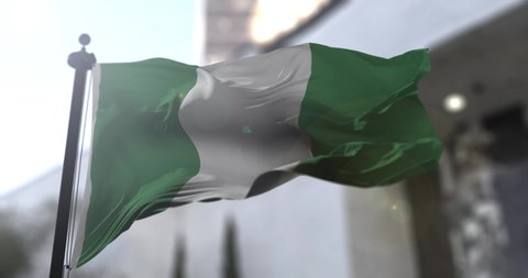 Nigerian national flag. Nigeria country waving flag. Politics and news illustration