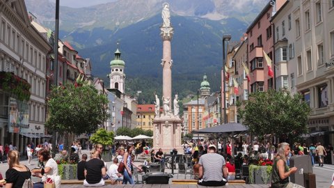 The historic district of Innsbruck with beautiful pedestrian zone and market square - INNSBRUCK, AUSTRIA - JULY 29, 2021