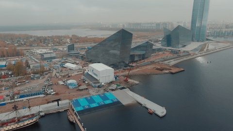 Russia, St. Petersburg, 14 October 2021: Aerial video filming of the new port Hercules with a replica of the old military frigate Poltava, the port next to the Lakhta center skyscraper