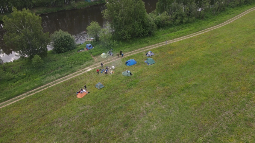 overflying a tourist camp by the river