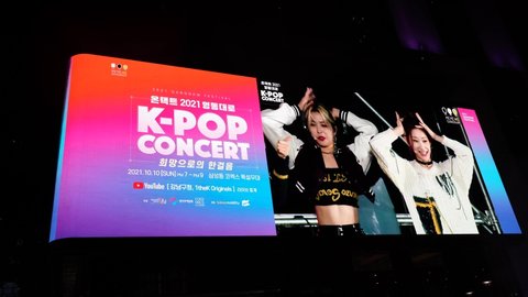Seoul, South Korea - October 10 2021 : K-pop Concert was live streaming on digital billboards at coex square. Itzy was meeting audience on screen. Concert was held online due to covid-19 restriction.