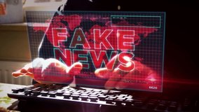 Fake news broadcast, trolling, false information, hoax, troll, propaganda, information and disinformation on screen. Working at home remotely concept. Camera moves around display and man typing keyboa - Powered by Shutterstock - Get 15% off with code: PIKWIZARD15